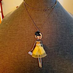 Super Cute Doll Pendent Necklace . 14 Inch Silver Doll Yellow Dress & Black Hat. Never Used Cute Adjustable Yellow Necklaces, Cute Adjustable Yellow Necklace, Handmade Yellow Necklace For Spring, Doll Pendant, Cute Doll, Pendent Necklace, Black Hat, Cute Dolls, Yellow Dress