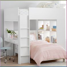 a white bunk bed sitting next to a desk