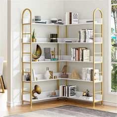 a white and gold bookshelf with lots of books on it's shelves