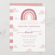 a pink and white card with an image of a rainbow in the sky on it