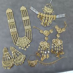 This Is Beautiful Punjabi Jadau Necklace With Gold Plated Earings For Women And Girls | Gold Plated And Pearl Jewellery | Sangeet Jewellery | Punjabi Jewellery | Nikah Jewellery | Indian Wedding / Gold Plated Set / One Gram Gold Set / Gold Necklace Set Made With Gold Plated , Pearls , Beads , Pipal Patti . Thank You :) Punjabi Wedding Jewelry Sets, Yellow Gold Chandbali Bridal Necklace, Heavy Gold Jewelry For Celebration, Yellow Gold Chandbali Bridal Necklace For Wedding, Kundan Jewelry Sets In Yellow Gold For Wedding, Kundan Yellow Gold Jewelry Sets For Wedding, Gold Chandbali Temple Necklace For Wedding, Wedding Chandbali Necklace With Intricate Design, Heavy Jewelry For Diwali Celebration