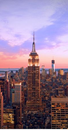 the empire building in new york city at sunset