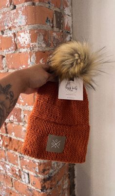 Cozy Collection Stay warm in this soft hat this winter. Knit hat with faux fur pom  C o z y logo 🤍 Color: Pumpkin Spice Cozy Soft Knit Hat For Fall, Soft Knit Winter Hats For Fall, Soft Knit Hat For Fall And Winter, Super Soft Fall Beanie Hat, Cozy Crochet Cap For Fall, Warm Fall Hats One Size, Cozy Outdoor Hat, Cozy One Size Bonnet For Fall, Cozy One-size Bonnet For Fall