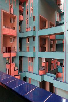 an apartment building with multiple balconies and windows