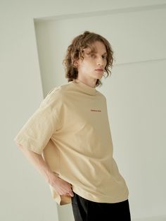 Editor's NotesOOT Basic T Shirt Beige from OUT OF TRUNK is a short sleeve T-shirt product with a loose silhouette. It has a small logo detail in the front. The neckline is a little high design.- Dropped shoulder- Neck detail- Embroidery detail- High quality stitchesMeasurements (in.)- 1- Length: 28.1 in.- Chest: 25.5 in.- Shoulder: 25.0 in.- Sleeve length: 10.8 in.Composition & Care- 100% Cotton- Dry Clean OnlyDesigner- by OUT OF TRUNK Beige Crew Neck T-shirt With Logo Print, Beige Short Sleeve T-shirt For Streetwear, Beige Cotton T-shirt With Logo Print, Short Sleeve Beige T-shirt For Streetwear, Beige Graphic Tee With Logo Print, Beige Logo Print Top For Streetwear, Beige Short Sleeve Top With Graphic Print, Beige Short Sleeve Top With Letter Print, Beige Relaxed Fit Graphic Tee