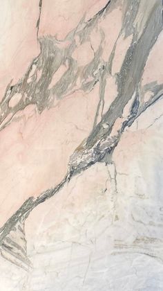 an image of marble that looks like it has been painted pink and grey with black streaks