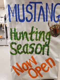 a sign that says hunting season now open