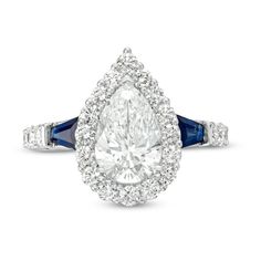 a pear shaped diamond and blue sapphire ring