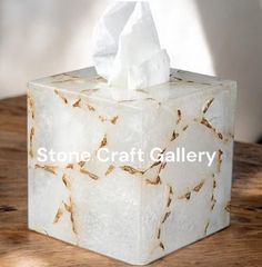 a tissue box that is on top of a table