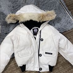 White Canada Goose Bomber In Size Xs. Very Warm. Lots Of Great Pockets. Pre-Loved. Discoloring And Slight Marks White Canada Goose, Canada Goose, Canada Goose Jackets, Puffer, Checks, Color White, Coats Jackets, Jackets & Coats, Jackets For Women