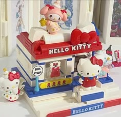 a hello kitty toy store with hello kitty figurines on the front and side