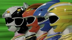 three different colored helmets are lined up against a green background with the words, power rangers on it