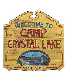 a wooden sign that says welcome to camp crystal lake