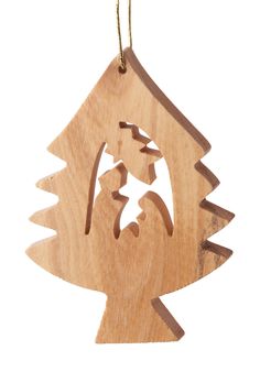 a wooden ornament with a house and tree