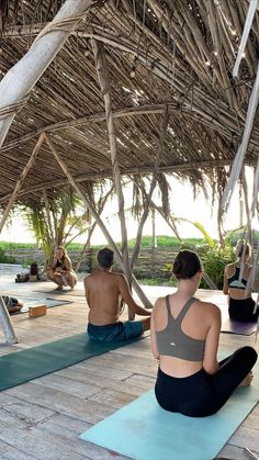 some people are doing yoga in the shade