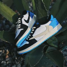 Step up your sneaker game with this Blue Custom Low Jordan 1 x Travis Scott! Its eye-catching blue color provides a bold statement, while its unique shape and design make it perfect for tackling any challenge that comes your way. Make a statement and show off your risk-taking side with this daring shoe. 🔥 100% genuine, Brand New.👟 Custom sneakers.💫 Every pair is hand-made to order.✨ Best quality waterproof and scratch-proof paints used.✨ 1000+ satisfied customers across various platforms. ... Modern Jordan Shoes For Streetwear With White Sole, Blue High-top Sneakers With Contrast Sole For Streetwear, Blue Urban Sneakers With Contrast Sole, Urban Blue Sneakers With Contrast Sole, Blue Sneakers With Laces For Streetwear, Modern Blue Low-top Sneakers, Blue Skate Shoes With Contrast Sole For Streetwear, Blue Sporty Sneakers For Streetwear, Sporty Blue Sneakers For Streetwear