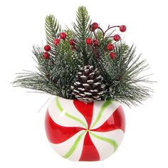 a red and white candy cane with pine cones on top is in a christmas vase