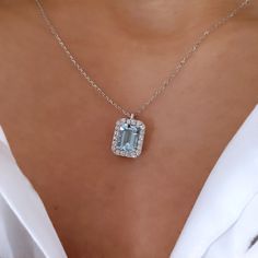 Aquamarine and Diamond pendant necklace in 18k white gold. Solid gold necklace with natural emerald cut aquamarine. Very bright aquamarine, the stone is very clean and without inclusions. Jewel of excellent quality and great elegance. The chain used is a rolò with a "diamond" finish, this finish creates light effects that make the necklace even more brilliant! You can choose the length of the chain. Our customers usually choose a length between 42 and 48 cm. Write us if you want to change the st Luxury Aquamarine Fine Jewelry Necklace, Emerald Cut Diamond Necklace, Aquamarine Necklace Pendant, Gem Engagement Rings, Royalty Fashion, Class And Elegance, Aquamarine Pendant, Aquamarine Necklace, Solid Gold Necklace