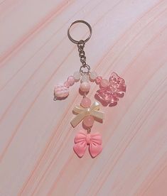 Each keychain is about 5 inches long with an adjustable lobster claw closure. Pink Keychain Ideas, Cute Pink Keychain, Pink Keychain, Pink Y2k, Y2k Coquette, Phone Charms, Coquette Bow, Beaded Accessories, Phone Charm