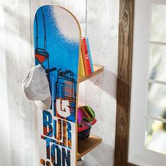 there is a skateboard that is on the shelf