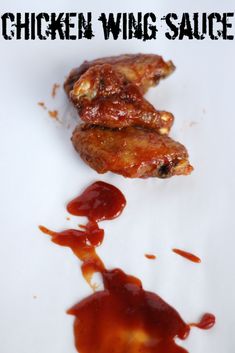 chicken wing sauce on a white plate with the words chicken wing sauce in black lettering