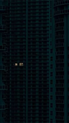 an airplane is flying in the sky over some tall buildings at night with one window lit up