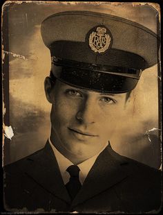 an old photo of a man in uniform