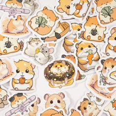 several stickers with various animals on them and one has a donut in the middle