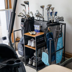 Freestanding Golf Club Organizer for Garage from StoreYourBoard.com Golf Club Storage, Golf Bag Storage, Golf Storage, Pinehurst Golf, Golf Essentials, Stacking Shelves, Wall Storage Systems, Clothing Displays, Solid Wood Shelves