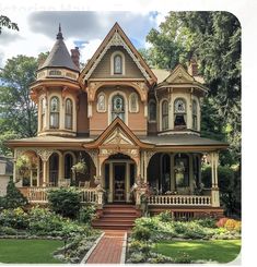 an old victorian style house with many windows