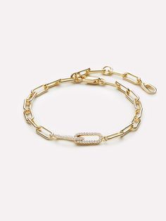 Our paperclip bracelet is a statement piece that rocks your inner minimalist. Finished in 14k gold and dotted with cubic zirconia gems, this paperclip bracelet can be stacked with other pieces or worn on its own as an eye-catching accent. Its sleek design secures with a lobster clasp and the delicate chain links will work well with any wardrobe. • Gold bracelet dotted with CZ gems • Finished in 14k gold • Perfect to wear alone or stack with other bracelets 2024 Wishes, Paperclip Bracelet, Trending Bracelets, Bracelet Love, Chain Links, Delicate Chain, Birthday Wishlist, Cute Bracelets, Trombone