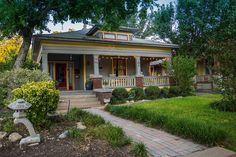 a house that is sitting in the grass