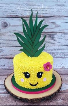 a pineapple cake with flowers on top