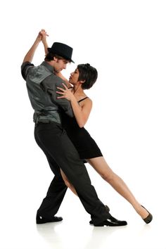 a man and woman are dancing together on the danceflosse floor with their arms around each other