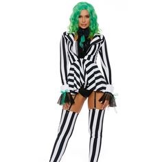 a woman dressed in a beetle costume posing for the camera with green hair and black and white striped stockings