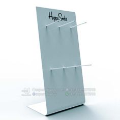 a white stand with three hooks on it and happy new year written on the side