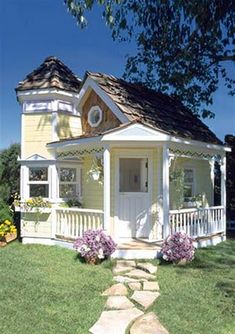 there are pictures of small houses in the yard