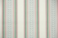 a striped wallpaper with green, pink and white designs on it's sides