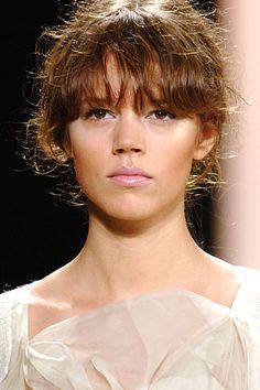 a close up of a person on a runway