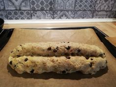 two pieces of bread sitting on top of a pan