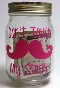 a jar with money in it that says don't touch my mustache