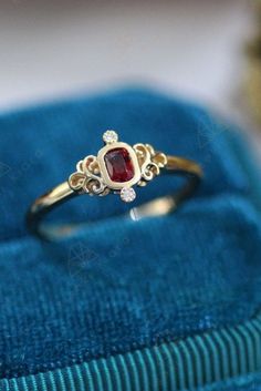 This vintage natural red spinel diamond ring is the best option to tie the knot #engagementring #diamondring #goldring #topazring Diamond Ruby Ring With Gemstone Accents For Anniversary, Heirloom Style Lab-created Ruby Diamond Ring As Gift, Heirloom Style Lab-created Ruby Diamond Ring Gift, Formal Red Rings With Bezel Setting, Exquisite Ruby Ring With Gemstone Accents For Anniversary, Red Bezel Setting Fine Jewelry, Red Fine Jewelry With Bezel Setting, Elegant Red Jewelry With Bezel Setting, Garnet Bezel Set Rings For Wedding