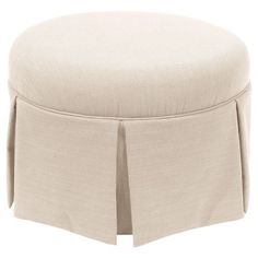 a round ottoman with pleated skirting on the front and back end, in light green