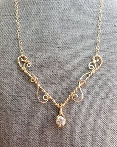 Stones: approx. 8 mm Moissanite Metal : 14K Gold Filled 19 inches approx. (Adjustable) Wire Wrapped Donut, Wire Wrapped Pendant Stones, Wire Necklace Ideas, Mermaid Trinkets, Wire Necklace Diy, Wire Jewelry Necklaces, Wire Necklace Pendant, Paperclip Art, Wire Necklaces