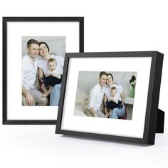 two black frames displaying an image of a family sitting on a couch with their children