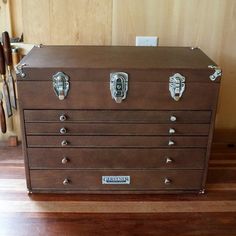 an old trunk is sitting on the floor