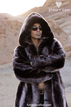 Elegant and stylish, this men's truffle brown hooded playa coat is the perfect addition to any festival fashion ensemble. Made with exclusive French Tissavel faux fur, this coat is not only silky soft but also thick and luxurious, ensuring both warmth and sophistication. Ideal for male fashion enthusiasts looking to make a statement at any event.  SHOP NOW! @ furrociousfurr.com. | Men's Fashion | Festival Style | Luxury Coat | French Faux Fur Festival Fashion Men, Mens Festival Fashion, Winter Coat Snow, Luxury Coat, Male Clothes, Winter Fashion Coats, Fashion Festival, Festival Style, Vegan Fashion