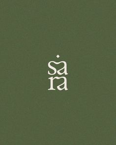 the word sa is written in cursive white on a dark green background,