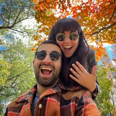 Engaged selfie flashing ring after fall proposal Fall Engagement Shoots, Fall Blue, Orange Palette, Engagement Shots, Fall Engagement, Spectacles, Blue Orange, Round Sunglasses, Sunglasses