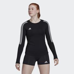 adidas Cut out for the volleyball court. This adidas HILO jersey combines stretchy fabric and a fit that supports overhead play. Moisture-wicking AEROREADY keeps you comfortable during intense action, and the droptail hem has you covered during every dive and leap. Running down the long sleeves, contrast 3-Stripes add the perfect sporty finish.Made with a series of recycled materials, and at least 60% recycled content, this product represents just one of our solutions to help end plastic waste. Adidas Long Sleeve, Volley Ball, Women Volleyball, Adidas Sportswear, Vetements T Shirt, Long Sleeve Jersey, Adidas Online, Adidas Performance, Judo